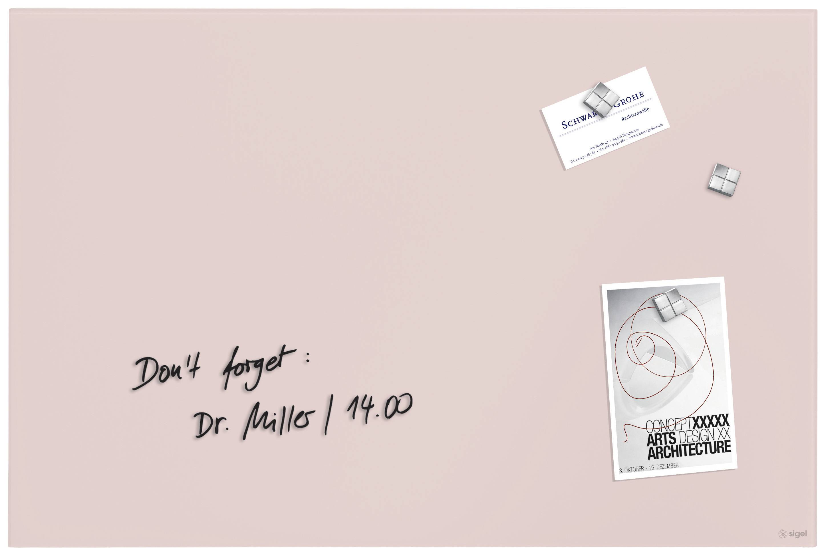 A note with a handwritten message 'Dr Mills / 2:00 pm'. Beside it, a business card and an event poster on a pink background.