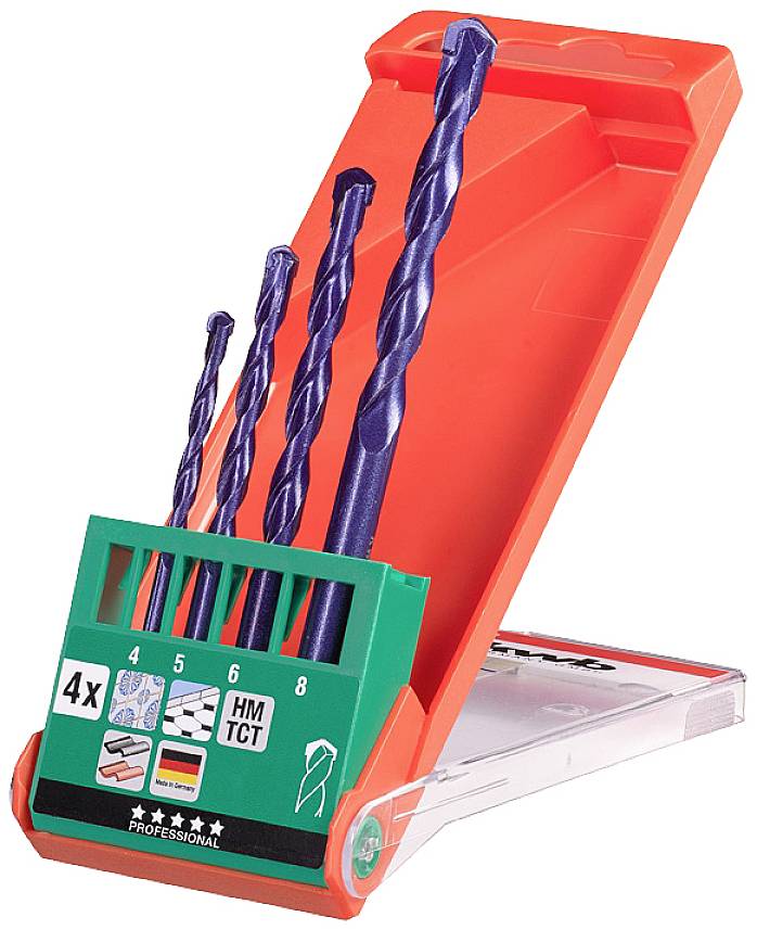 Four woodworking drill bits in various sizes in a red storage box with a green holder; suitable for precise drilling in wood.