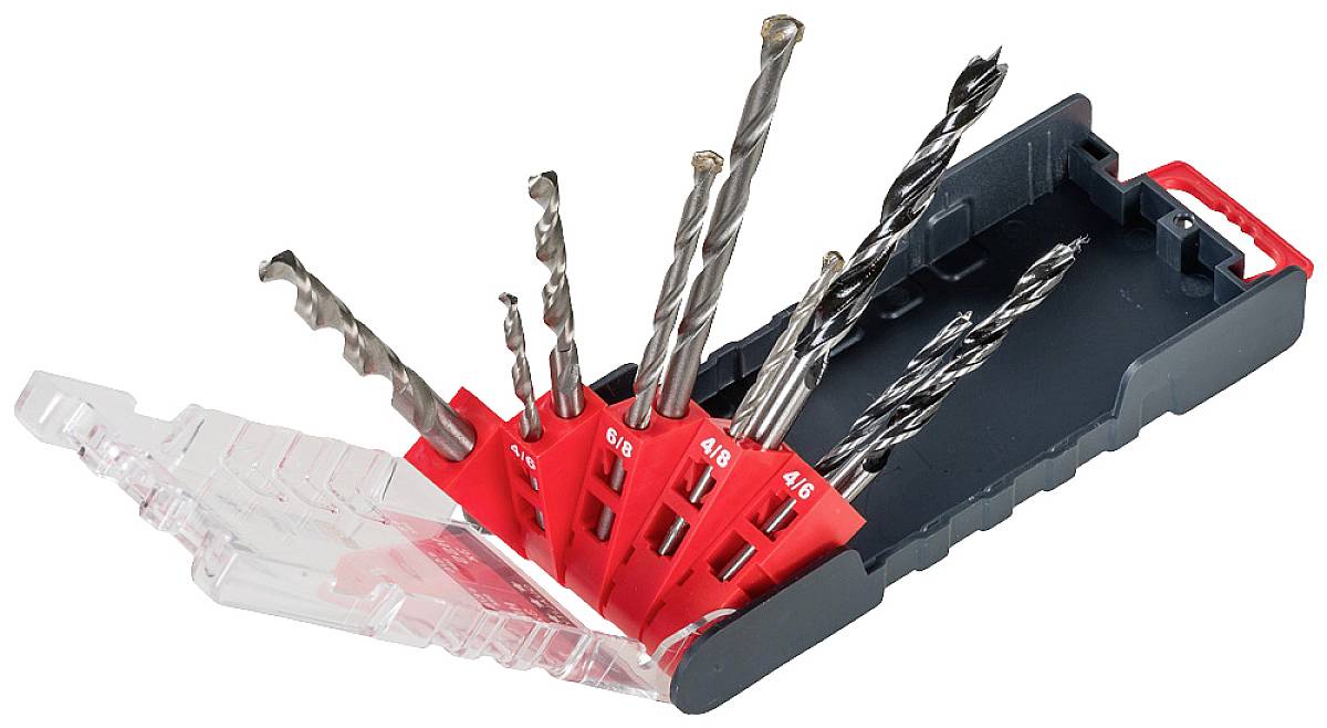 A set of seven metal drill bits in various sizes, neatly arranged in a red and black plastic case.