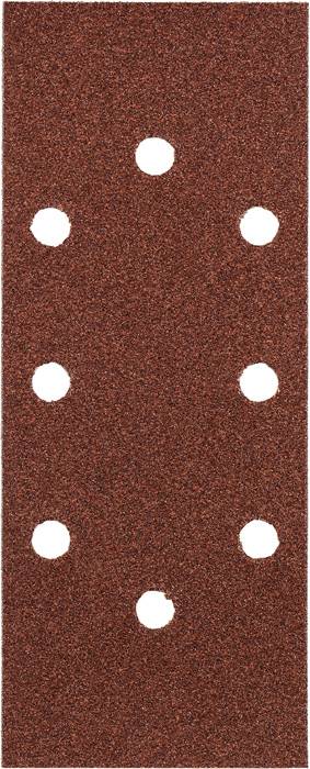 Brown sandpaper with seven round holes in a symmetrical arrangement.