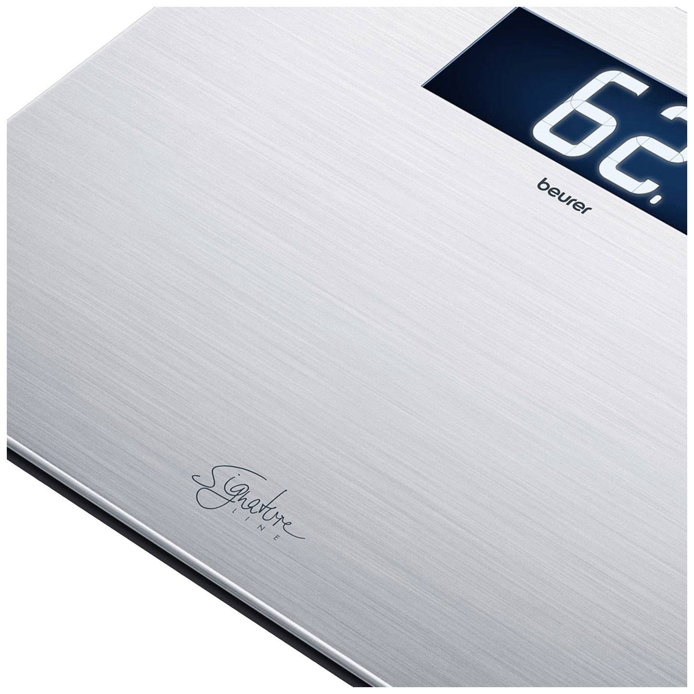 Digital personal weighing scales with a metallic surface, displaying a weight of 62 kg.