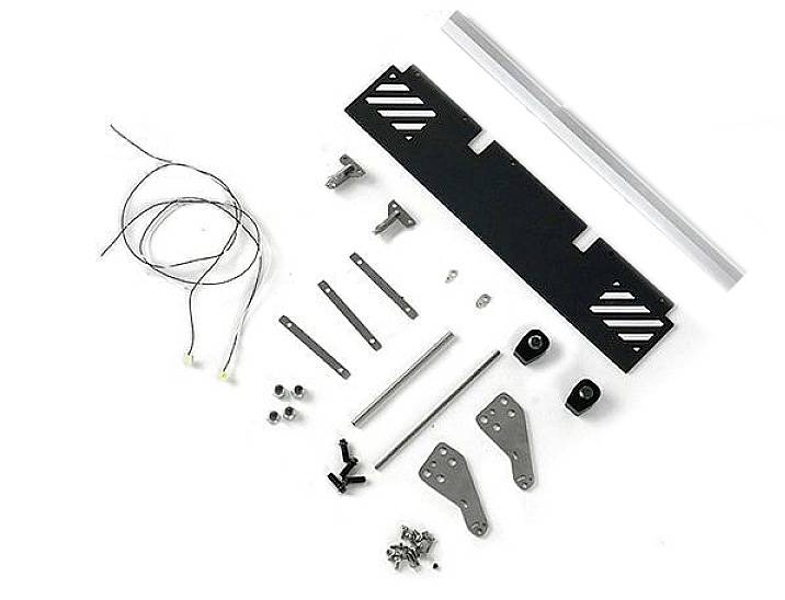 Components of an assembly kit on a white background, including metal plates, screws, cables, and brackets, arranged in an orderly manner.