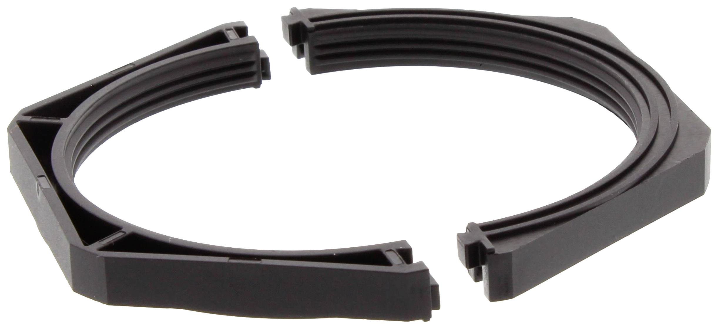 Two black, semi-circular plastic parts that are meant to form a circular ring lie side by side on a white background.