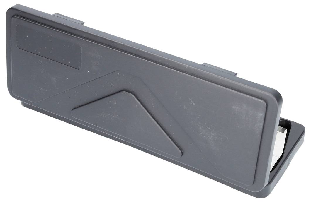 A rectangular black plastic lid with slightly raised geometric shapes on the surface.