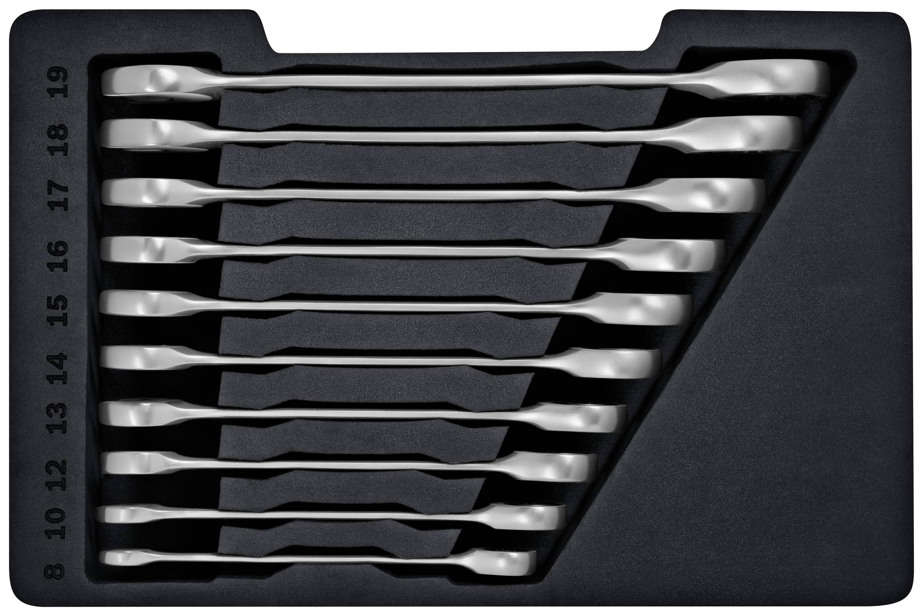 A sentence with eleven silver ring keys ranging from size 8 to 19, neatly arranged in a black foam insert.