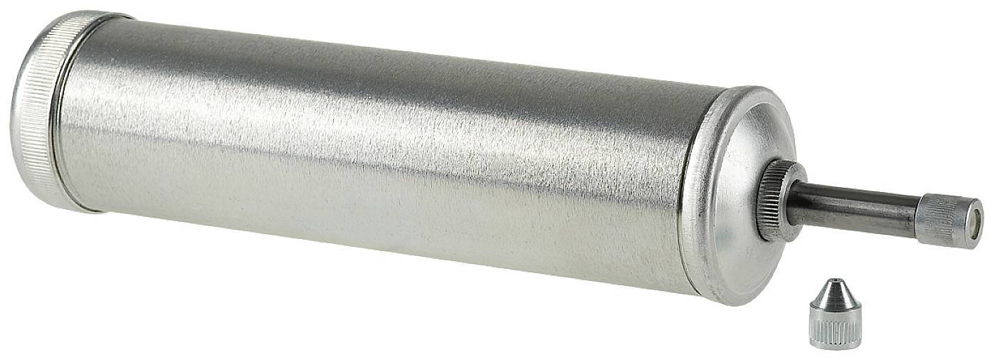 A silver grease gun with a removable nozzle, lying down. Used for precisely applying lubricant.