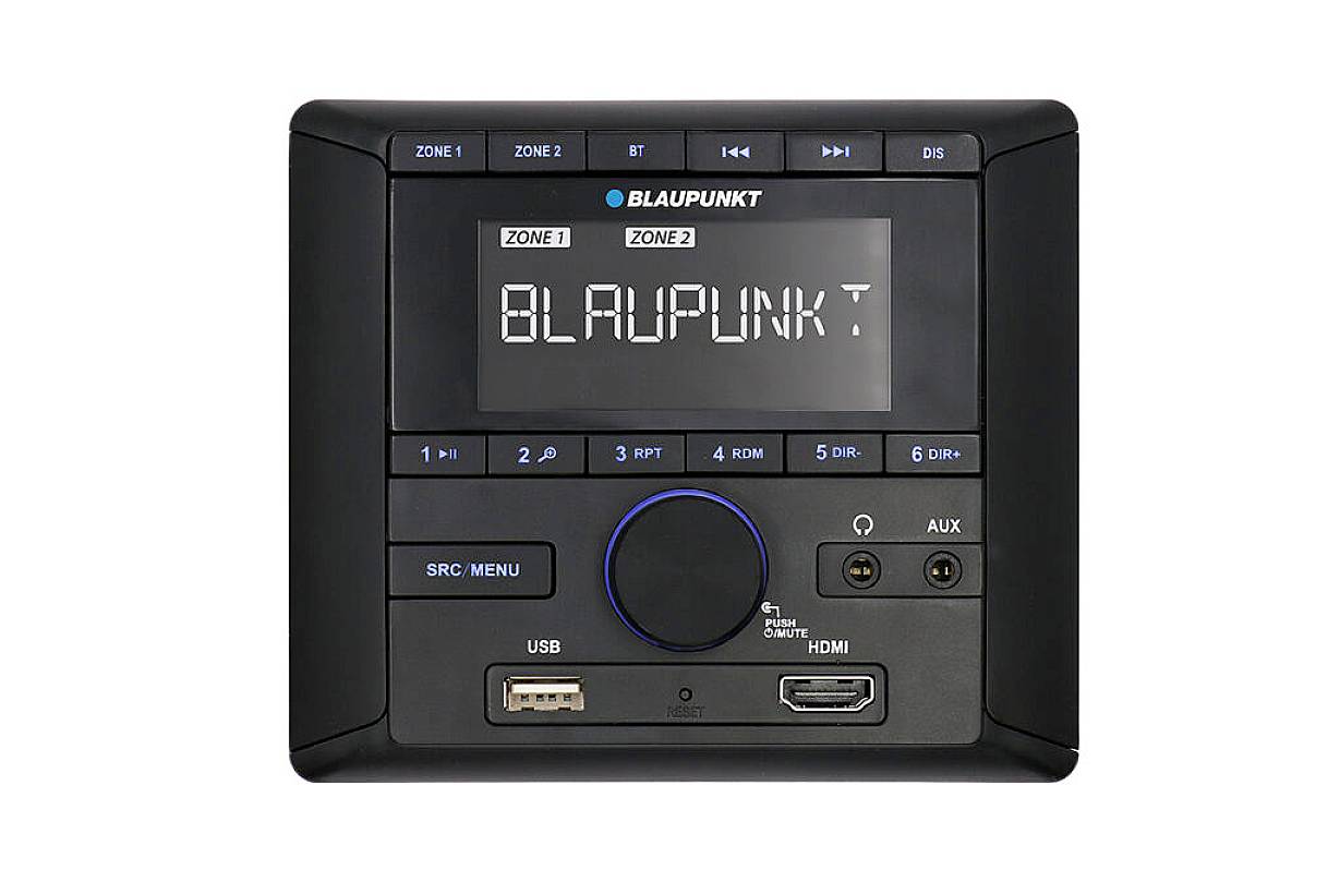 A black Blaupunkt car radio with controls and connections. Displays the text 'Blaupunkt' on the screen. USB and HDMI ports available.