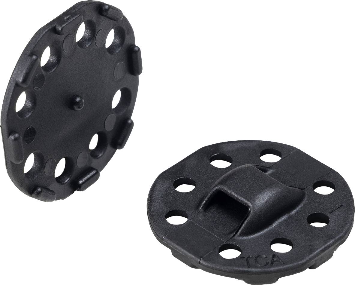 Two black plastic parts, each with multiple holes and a central raised area, potentially for mounting purposes.