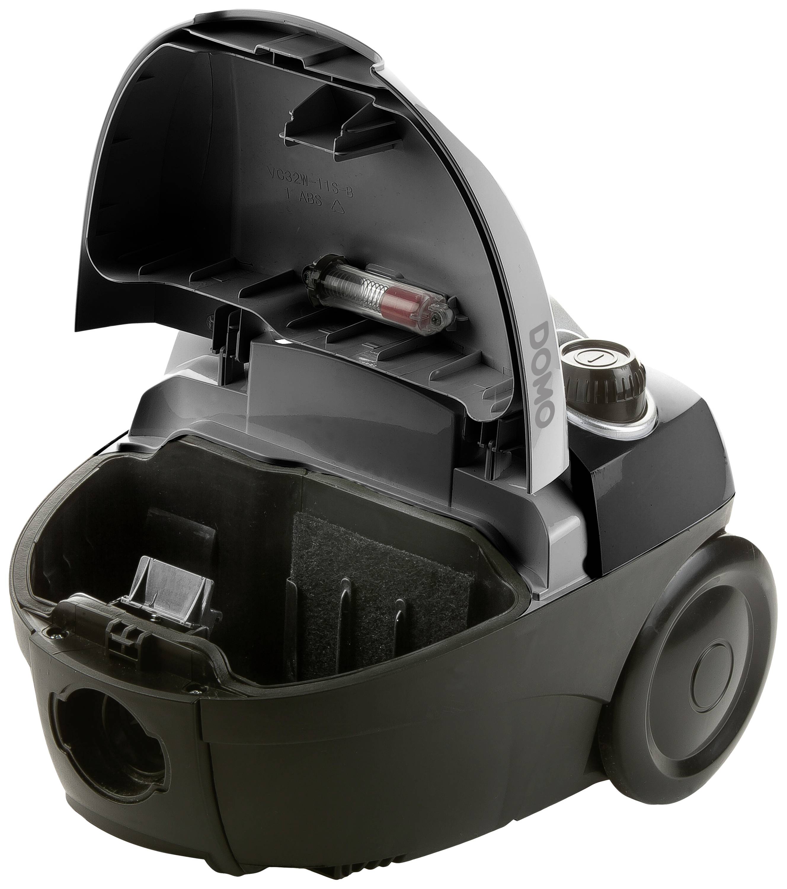 An opened, black vacuum cleaner with the lid removed, reveals its empty interior and the mounting bracket for a filter cartridge.