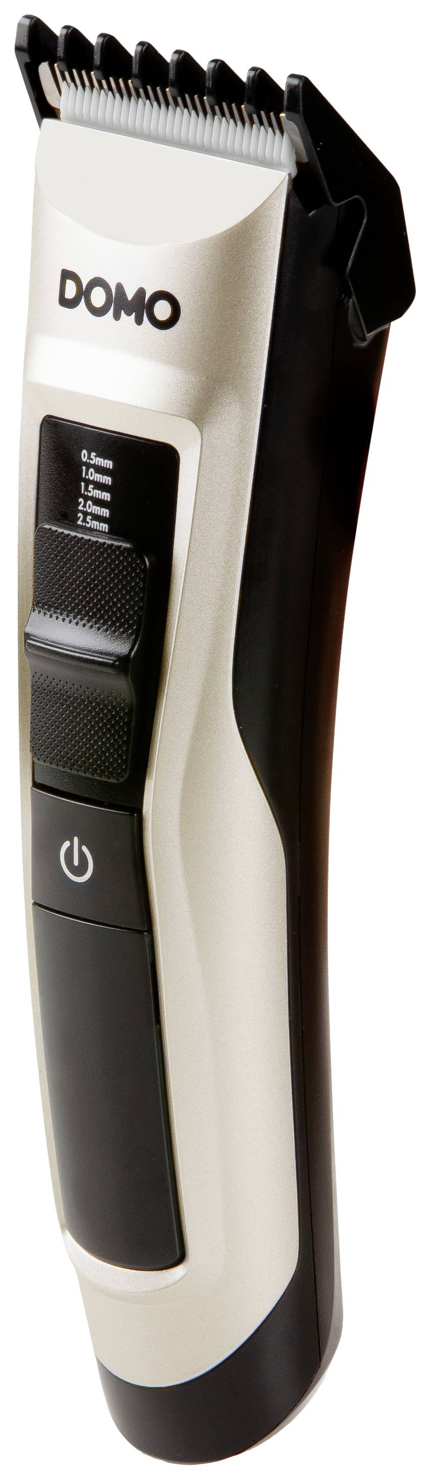 Electric hair clipper by 'DOMO' in silver and black, with length adjustment button and power on/off switch.