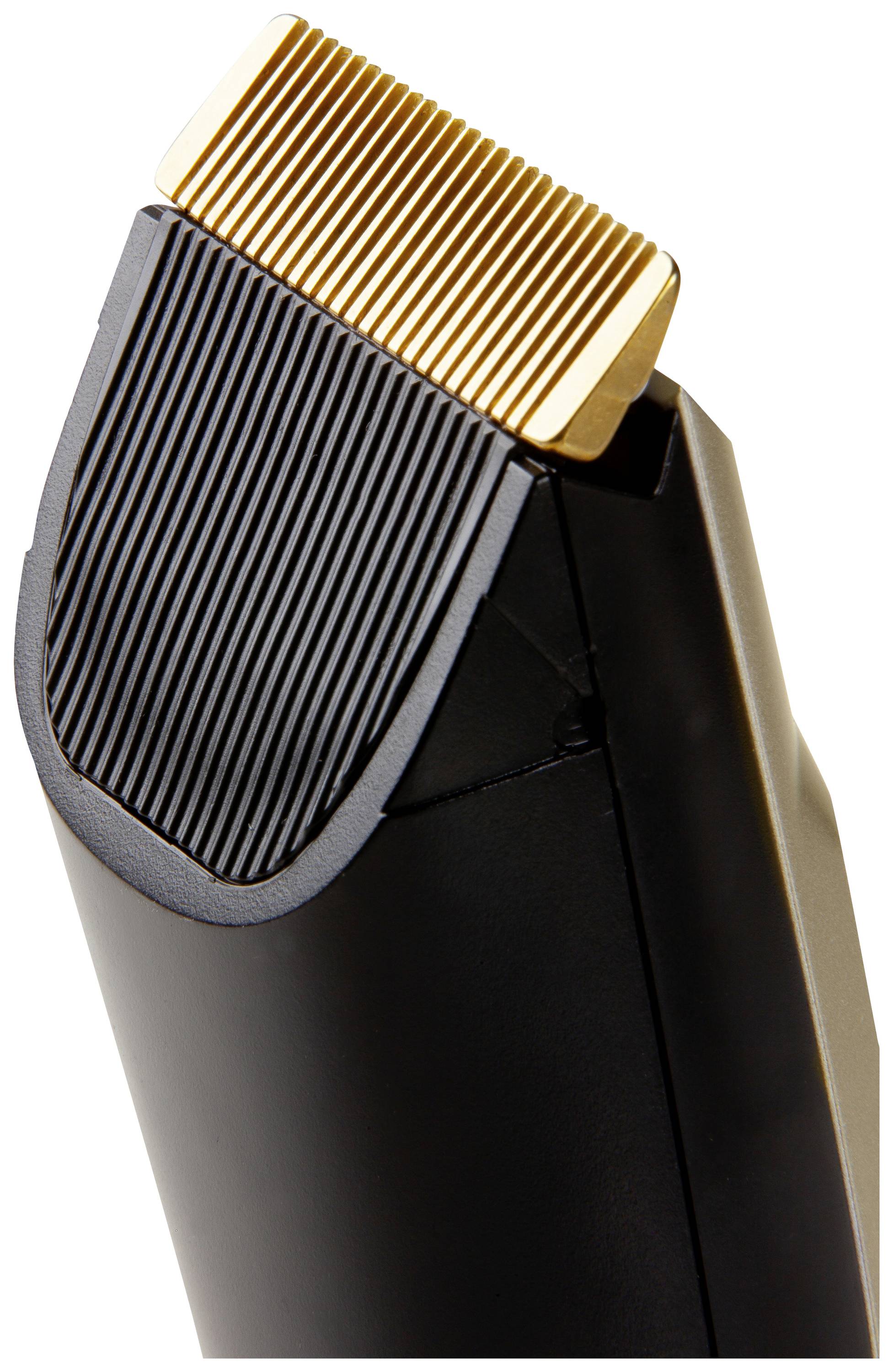 Electric hair clipper with a gold-coloured blade and black casing, shown at a slight angle.
