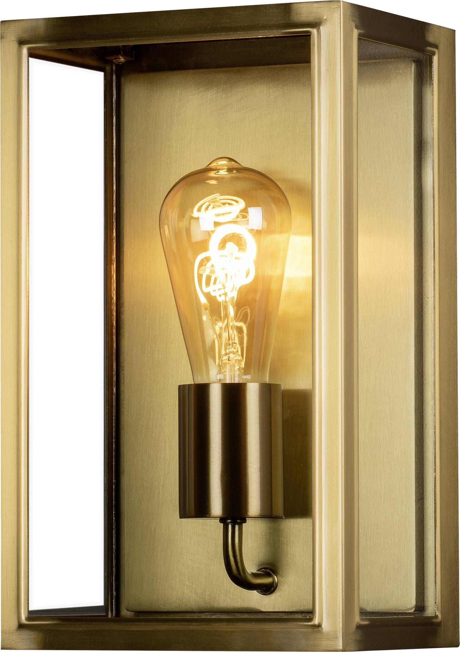 A golden wall light with a visible light bulb in a rectangular housing.