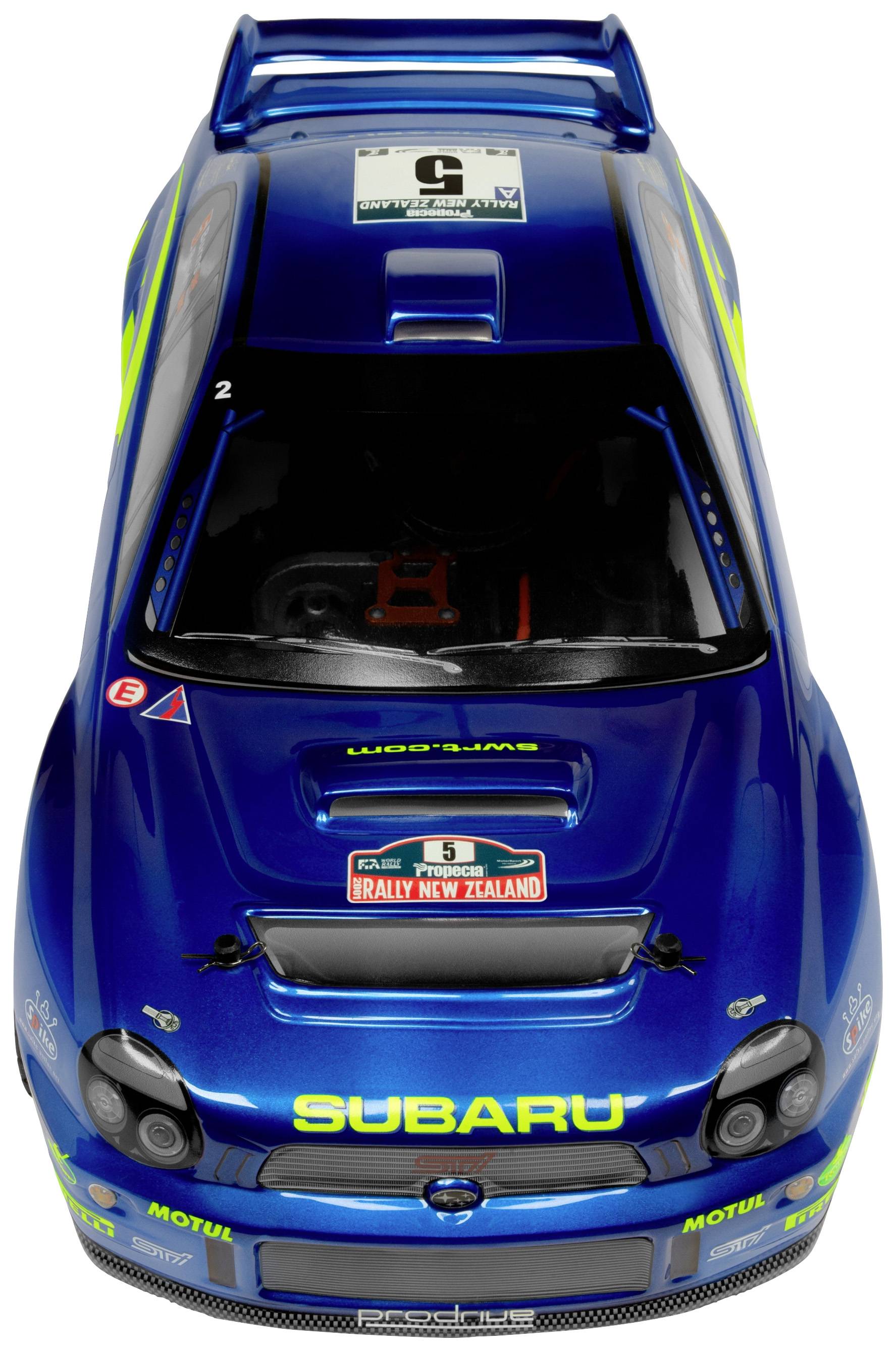 A blue racing model car with stickers and the inscription 'SUBARU' on the bonnet.