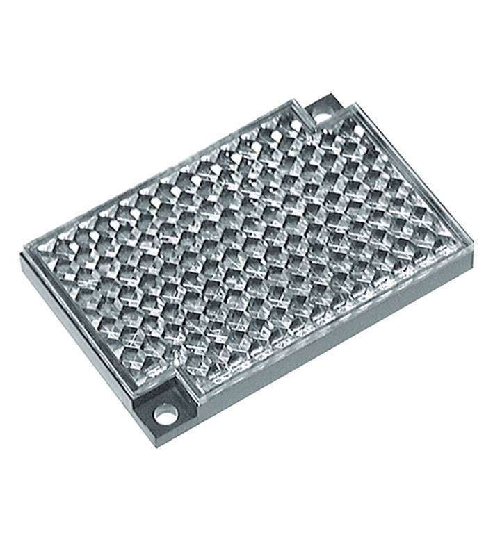 Rectangular, silver-coloured reflector with a honeycomb-like pattern, featuring two mounting holes at the corners. Used to enhance visibility.