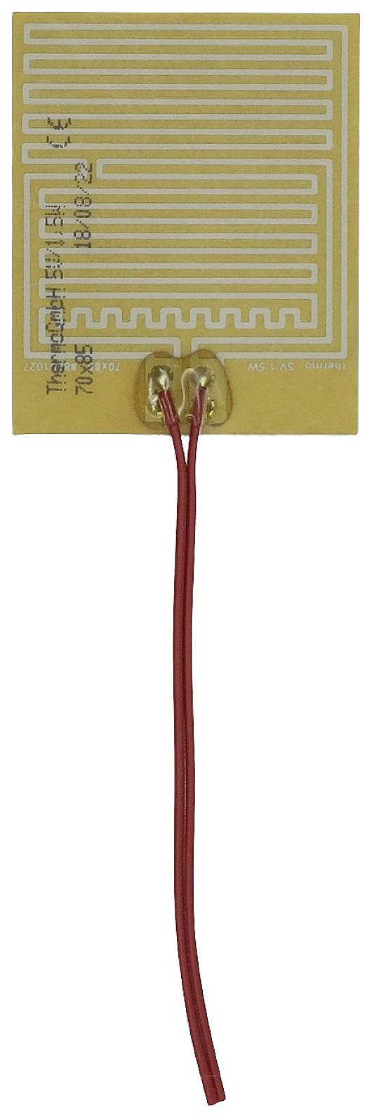 A flexible heating element with red cables, rectangular in shape, shows a coiled heating pattern on a yellow surface.
