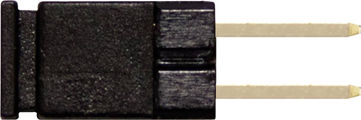 Black and yellow jumper used to connect two adjacent electrical pins on a circuit board.