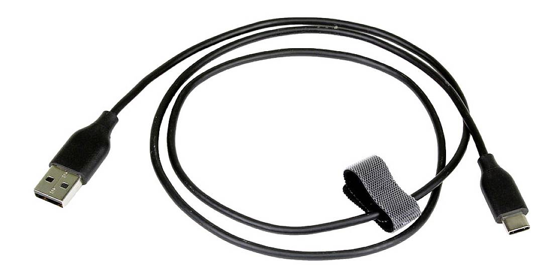 A black USB cable with USB-A and USB-C connectors. It is equipped with a hook-and-loop fastener for tidy storage.