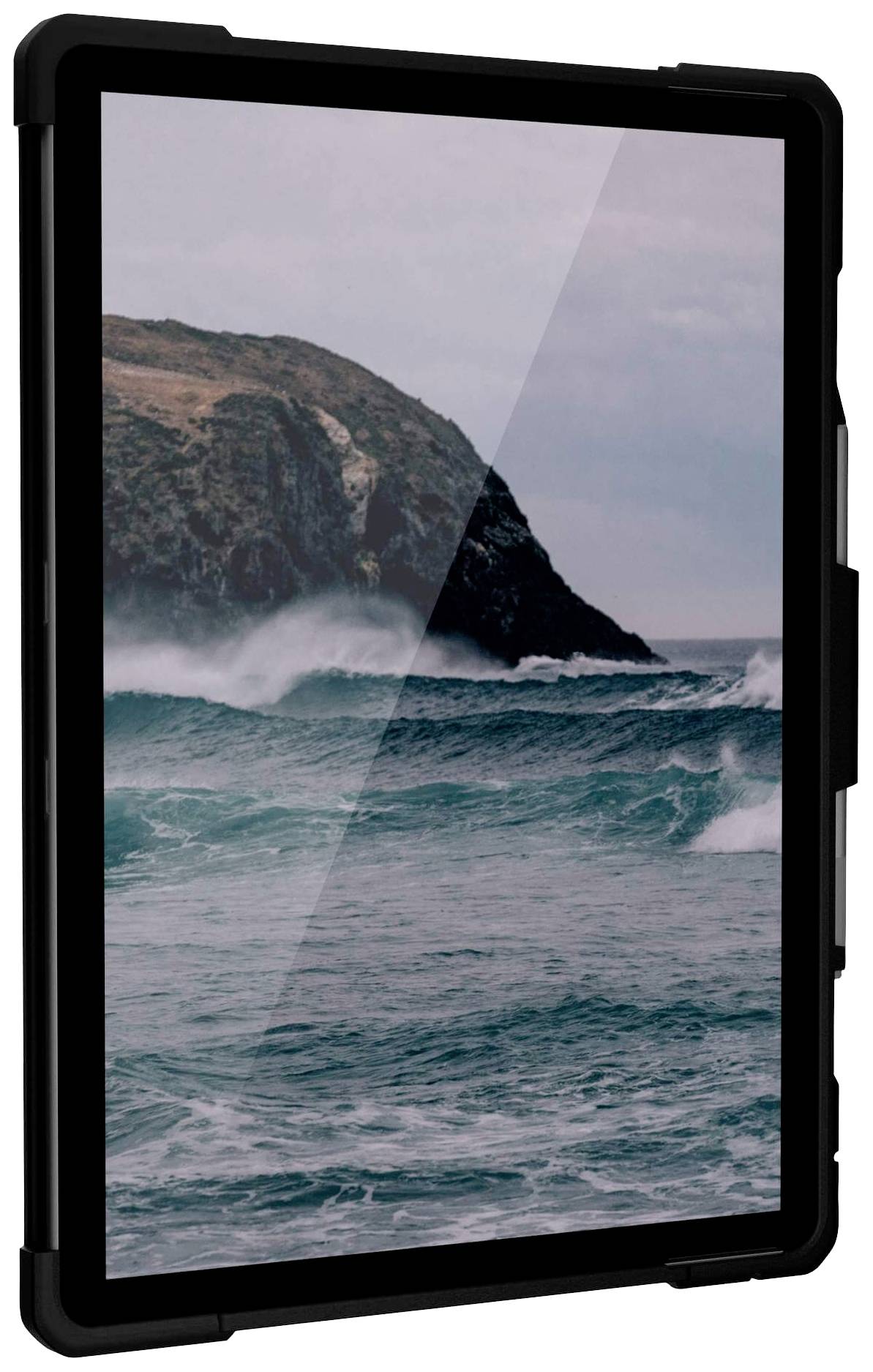 A tablet displays a stormy sea with large waves and a rocky coastline in the background.