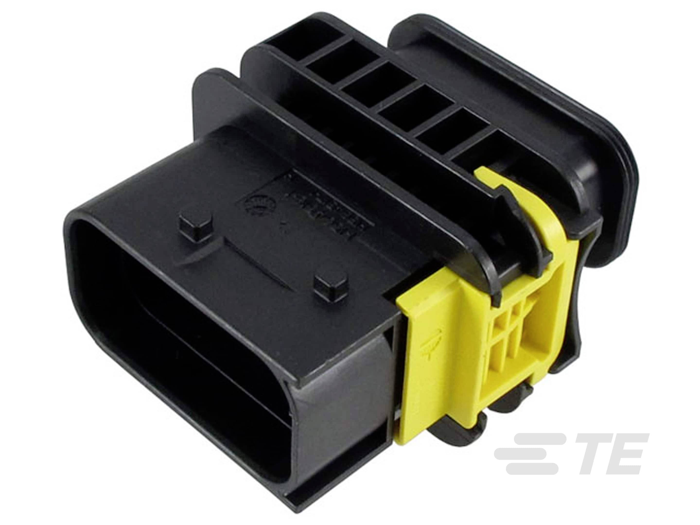 A black electric connector with a yellow locking clip.