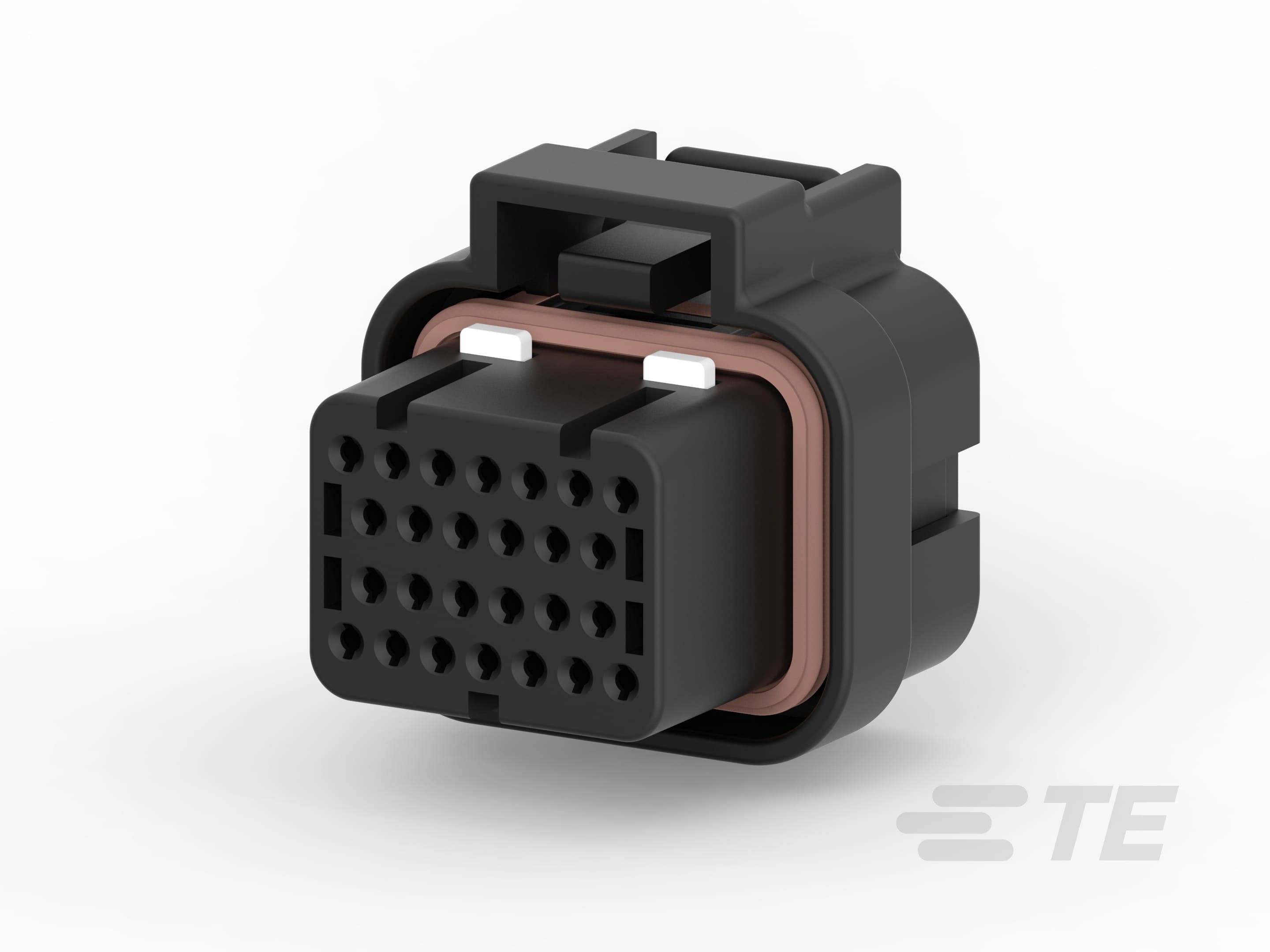 A black electrical plug with multiple connections, rectangular in shape and with an orange seal, manufactured by TE.