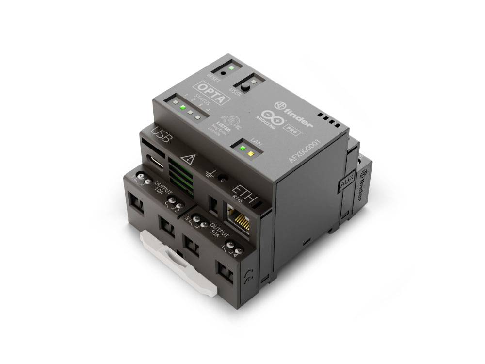 Compact electronic control unit with USB and Ethernet connections. Suitable for industrial applications and automation.