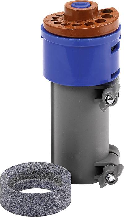 A grey water filter with a blue and red top section. Beside it lies a round sponge ring. The filter has two metal screws.