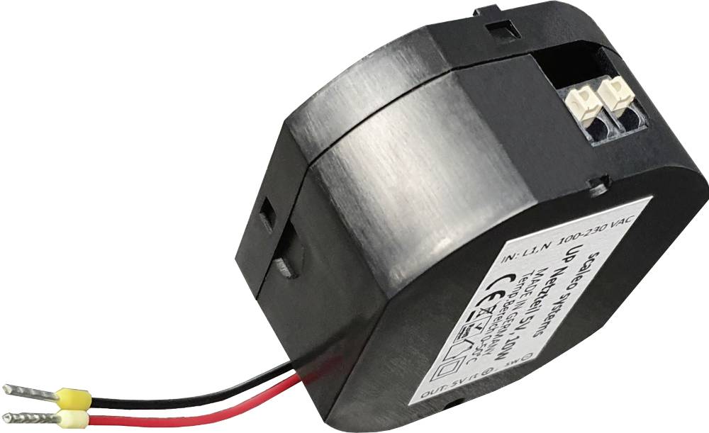 A black transformer with two coloured cables and connection terminals. Technical specifications are printed on the side.