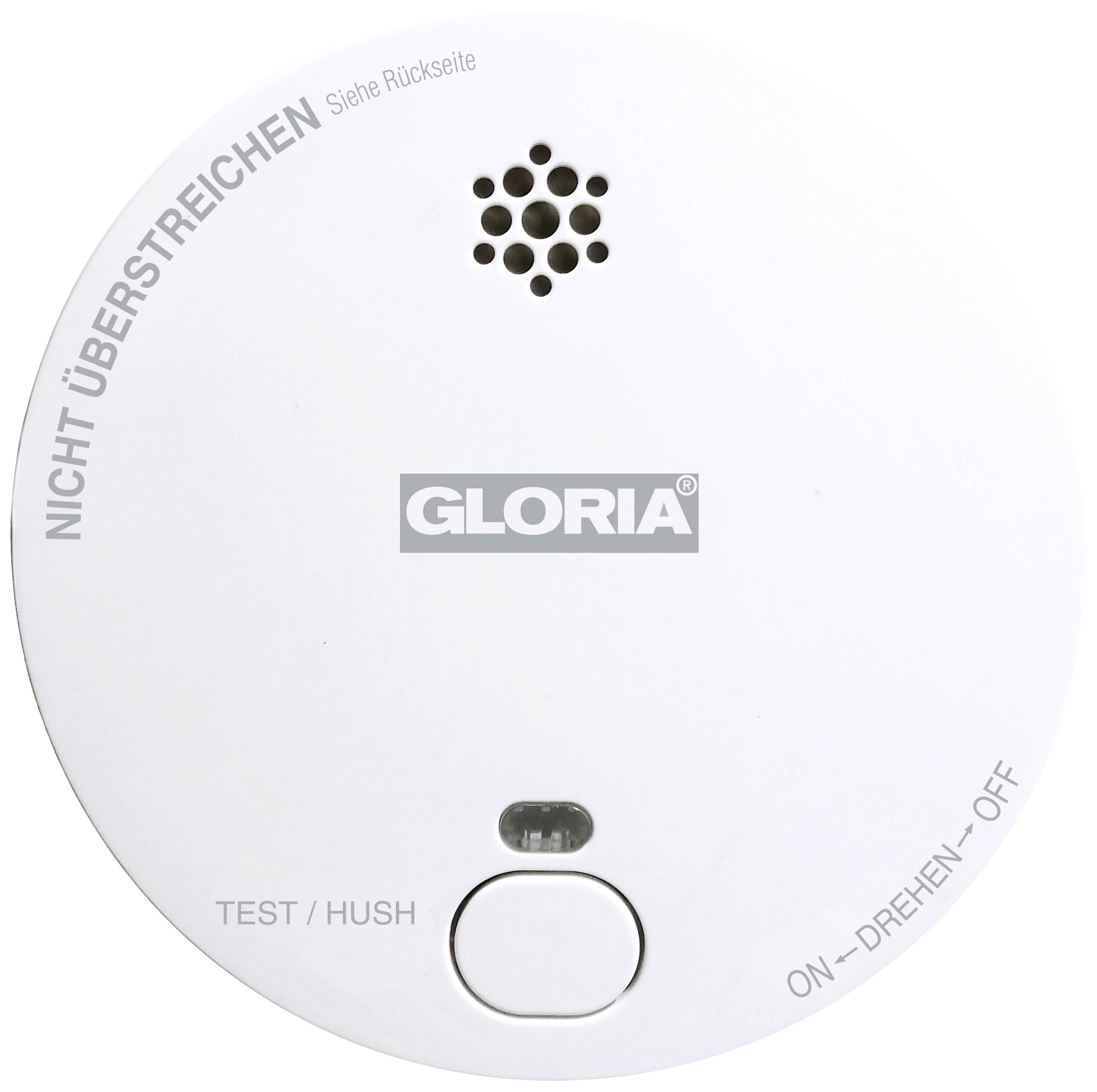 Round smoke detector with 'GLORIA' printed on it, featuring a test button, a small grille for the alarm sound, and usage labels.