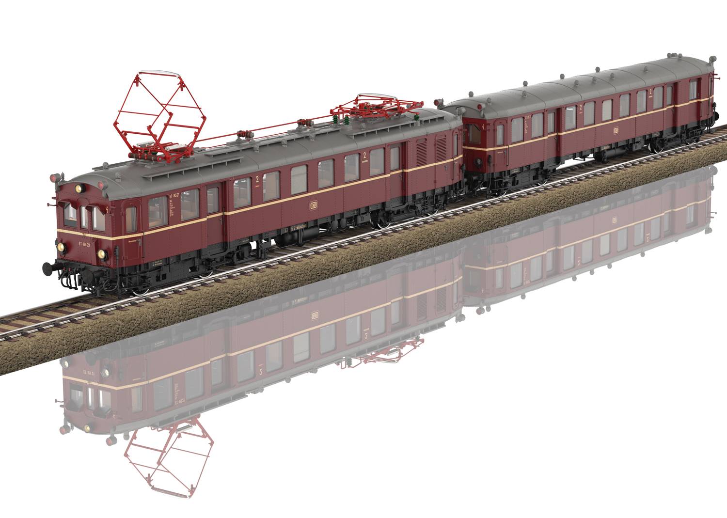 A red model train with two carriages is running on tracks. The train has a pantograph and is reflected on a smooth surface.