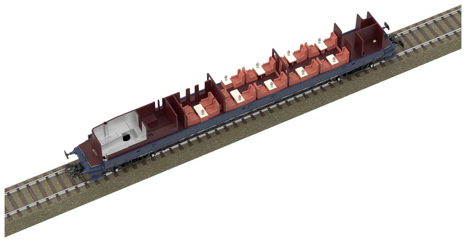 A red, empty goods locomotive without a roof is travelling on railway tracks.