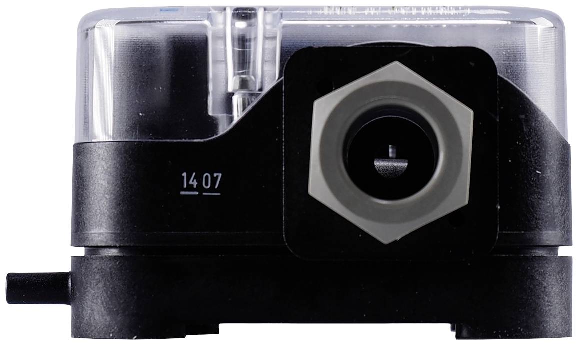 A black device with a transparent casing, displaying the numbers '14 07' on it. It has a hexagonal opening at the front.