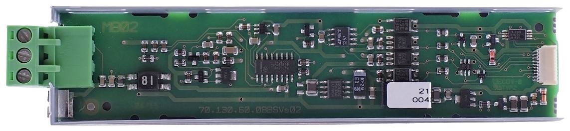 Electronic circuit board with various components, green connection block on the left, central microchips and diverse electronic elements.