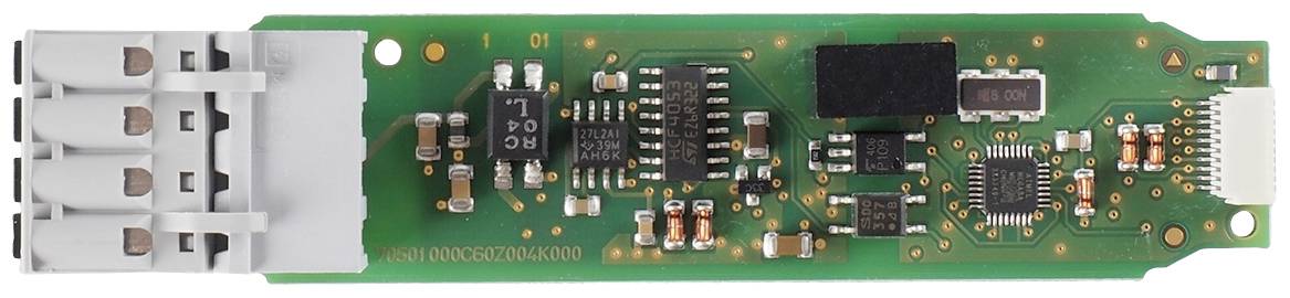 Green electronic circuit board with multiple chips and connectors, likely part of a larger electronic device.