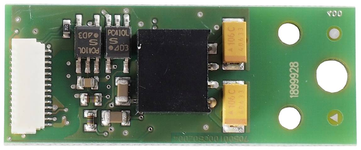 Electronic circuit board with various components, including capacitors and integrated circuits, on a green PCB. Primarily for technical purposes.
