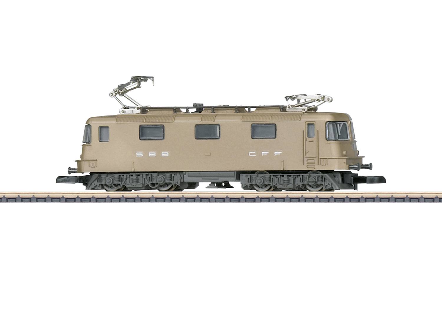 Side view of a detailed model railway locomotive on tracks.