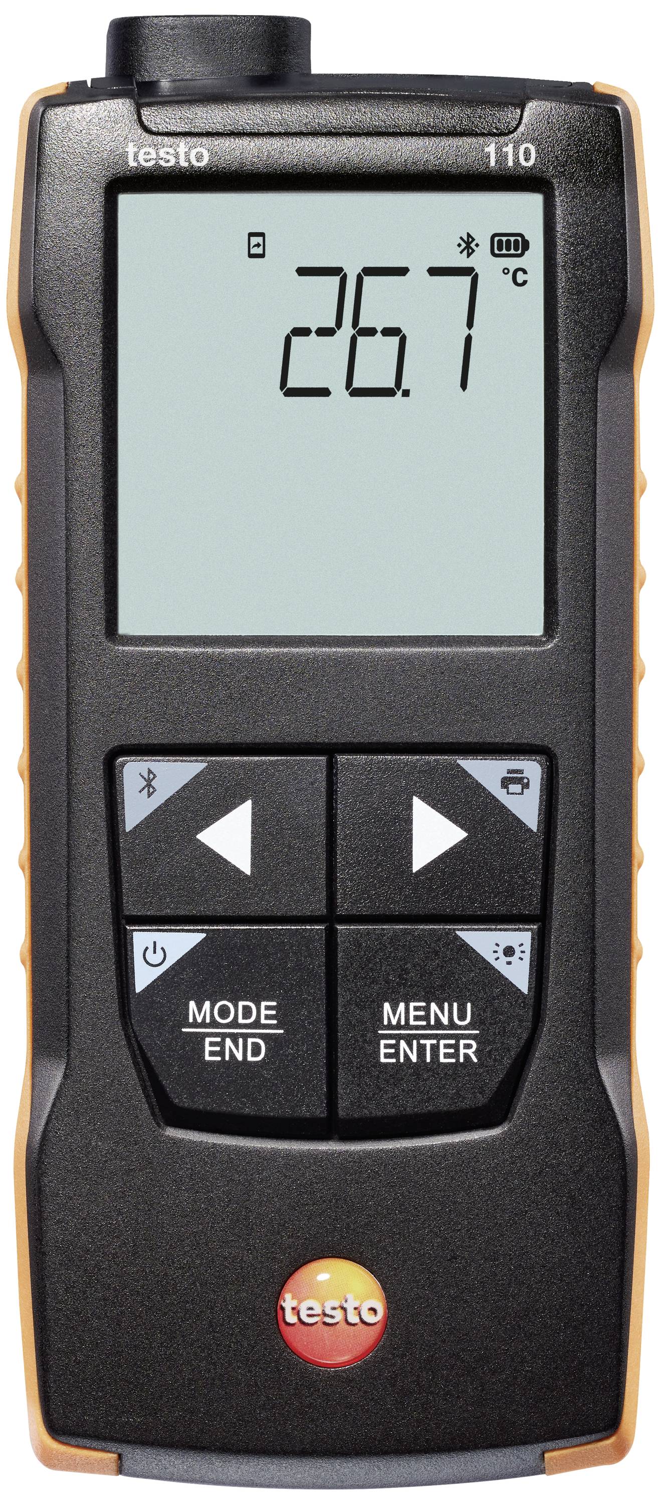 Digital thermometer with display showing 26.7 °C. Black device with orange accents and control buttons beneath the display.