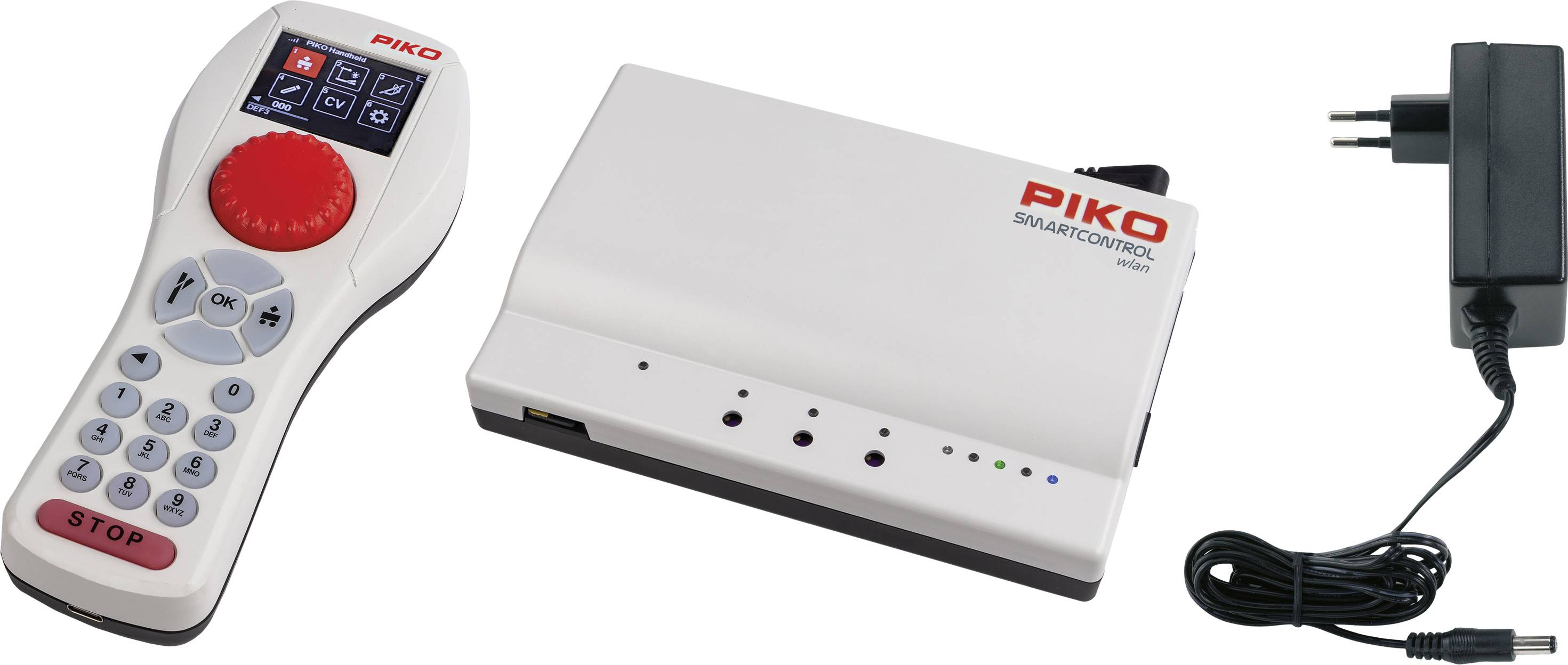 Remote control and control centre with PIKO logo, connection cable. Electronic system for controlling model railways.