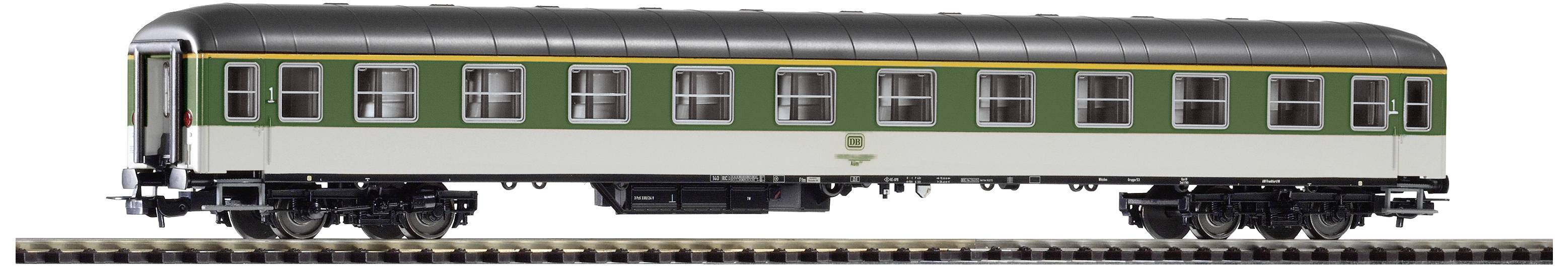 A model of a green and cream-coloured railway carriage on a track, with a yellow stripe beneath the roof.
