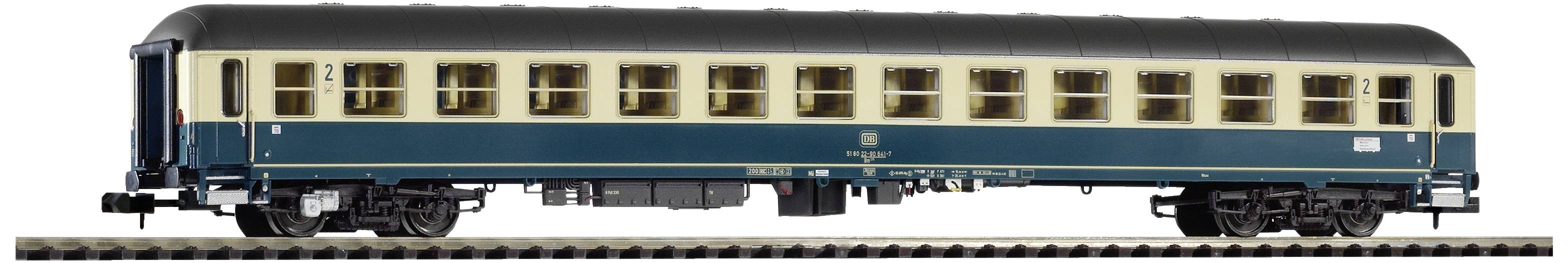 A blue and cream-coloured passenger train of the Deutsche Bundesbahn with a grey roof on a railway track. N gauge model.