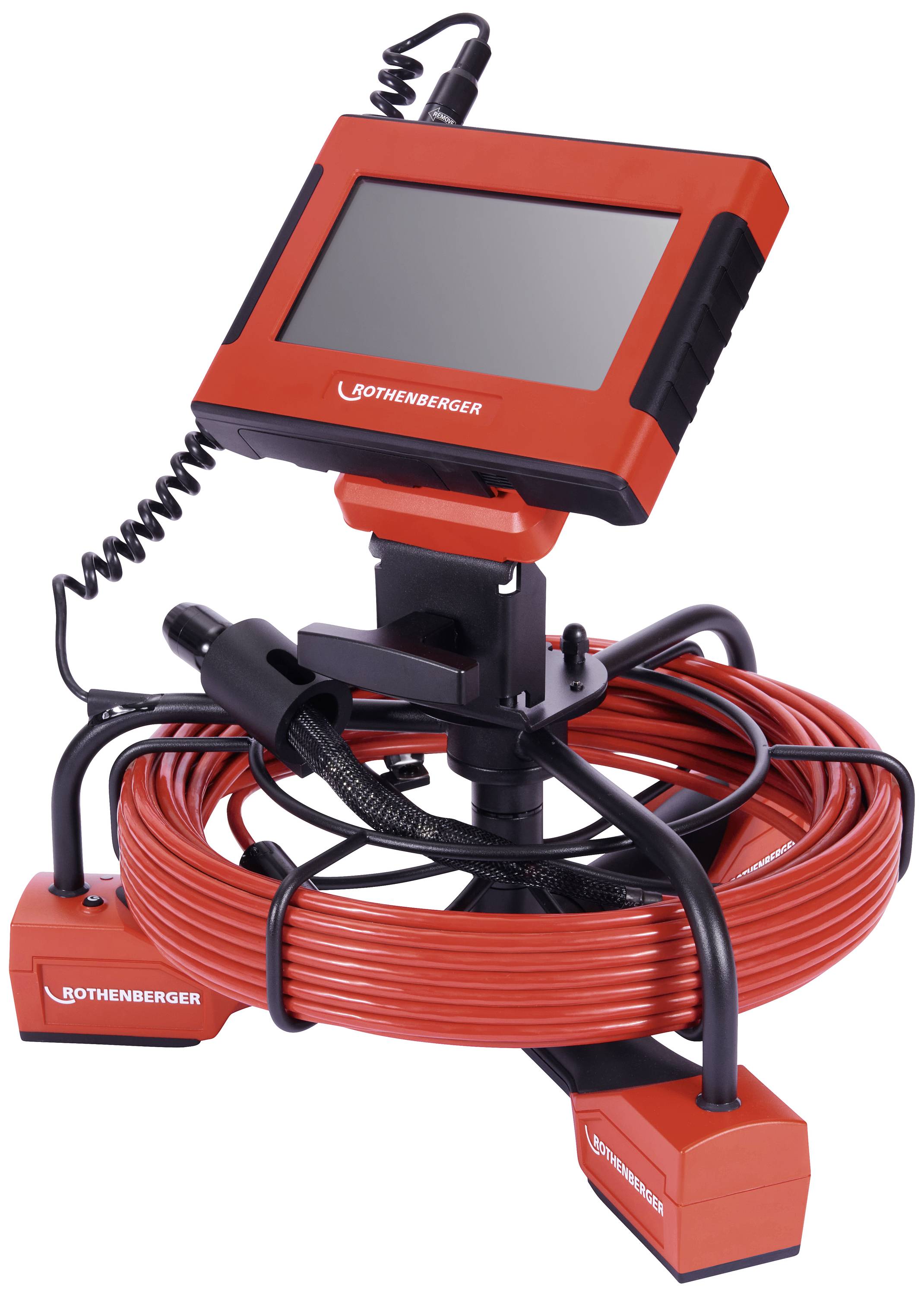 Inspection camera with screen and long red cables wound on a carrier, for pipe and channel inspection.Correction to British English:Inspection camera with screen and long red cables wound on a carrier, for pipe and drainage investigation.