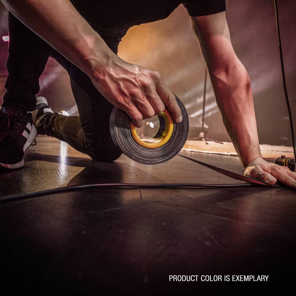 A person on stage is holding a cable ring in their hand while leaning forward. Bottom right reads 'PRODUCT COLOUR IS EXEMPLARY'.