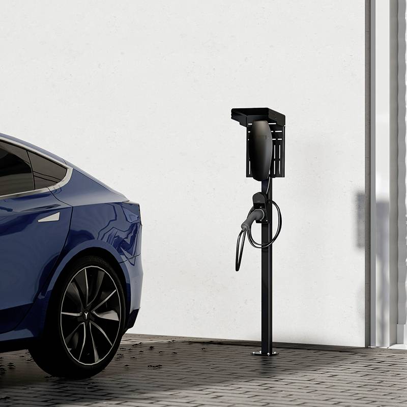 An electric car is being charged at a charging station in a car park.