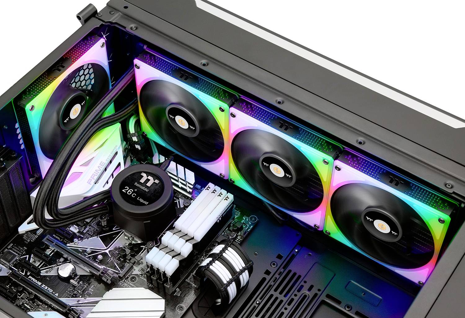 A computer case with an integrated motherboard, four RGB fans and a CPU cooler. Visible cables are neatly routed.