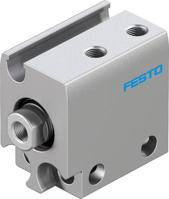 A metallic pneumatic cylinder with four mounting holes and a compressed air connection. Brand logo on the side.