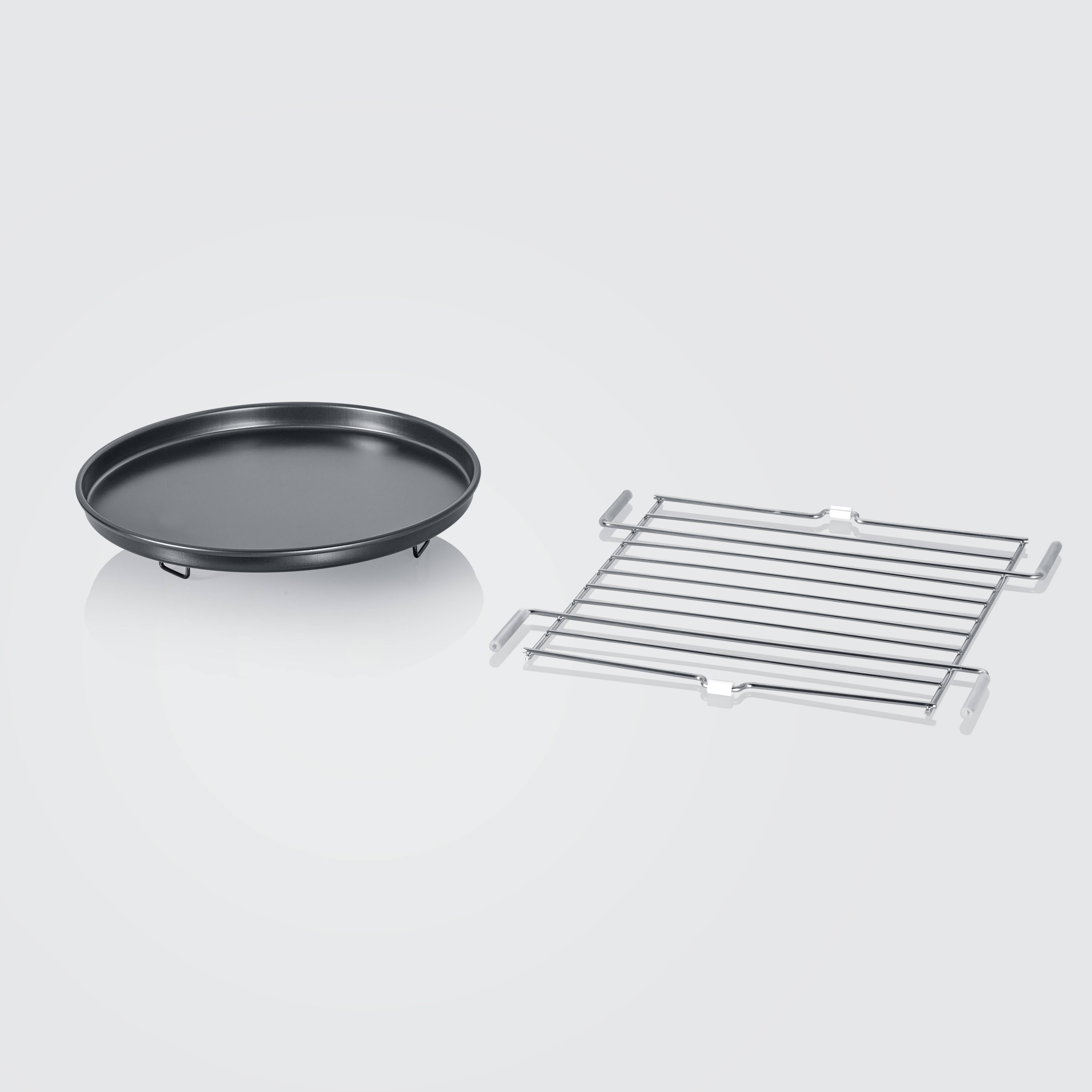 Round baking tray and metal rack on a light background. The baking tray is black and the rack silver, both placed side by side.
