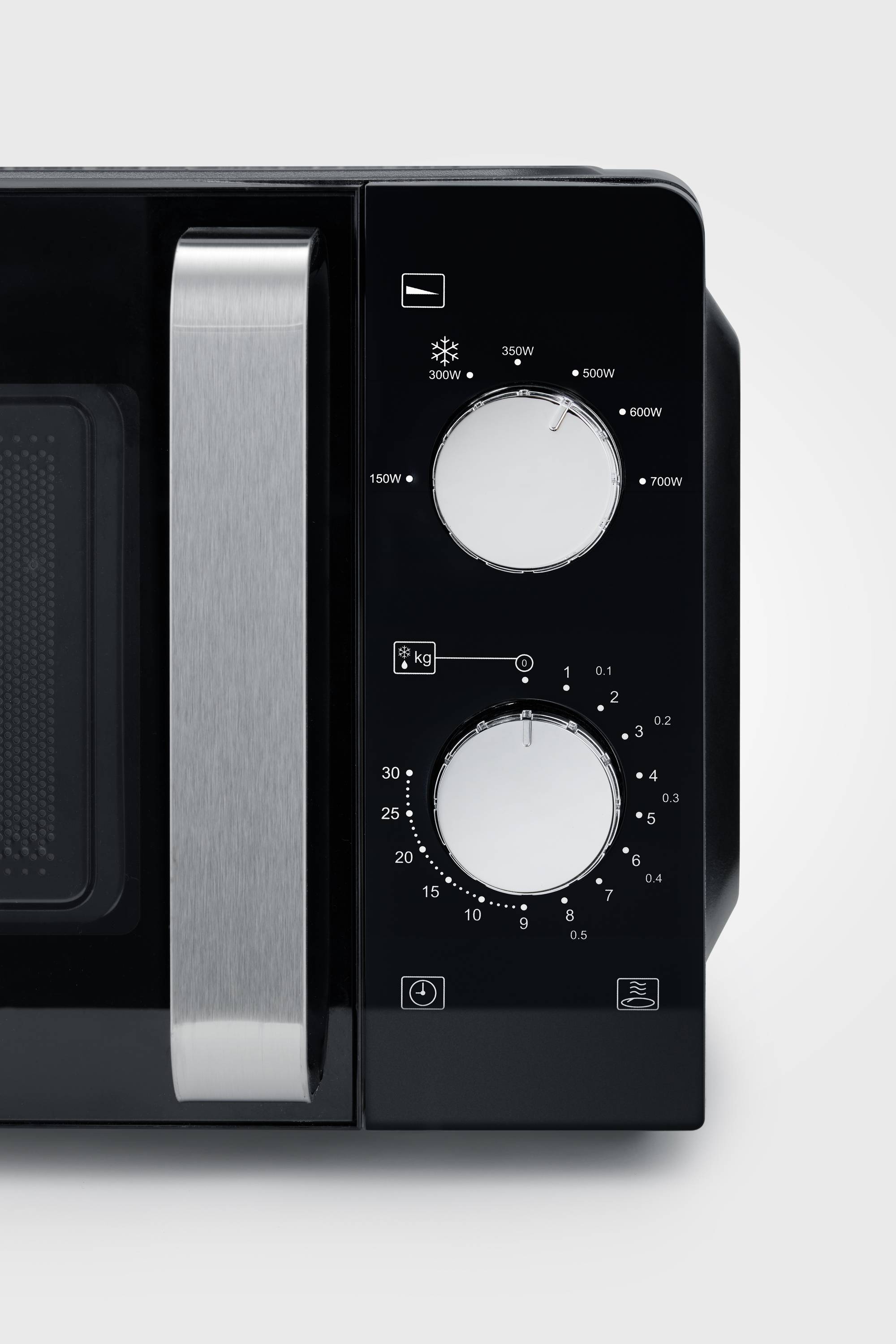 Black and silver microwave with two rotary dials: one for power settings, the other for time control.