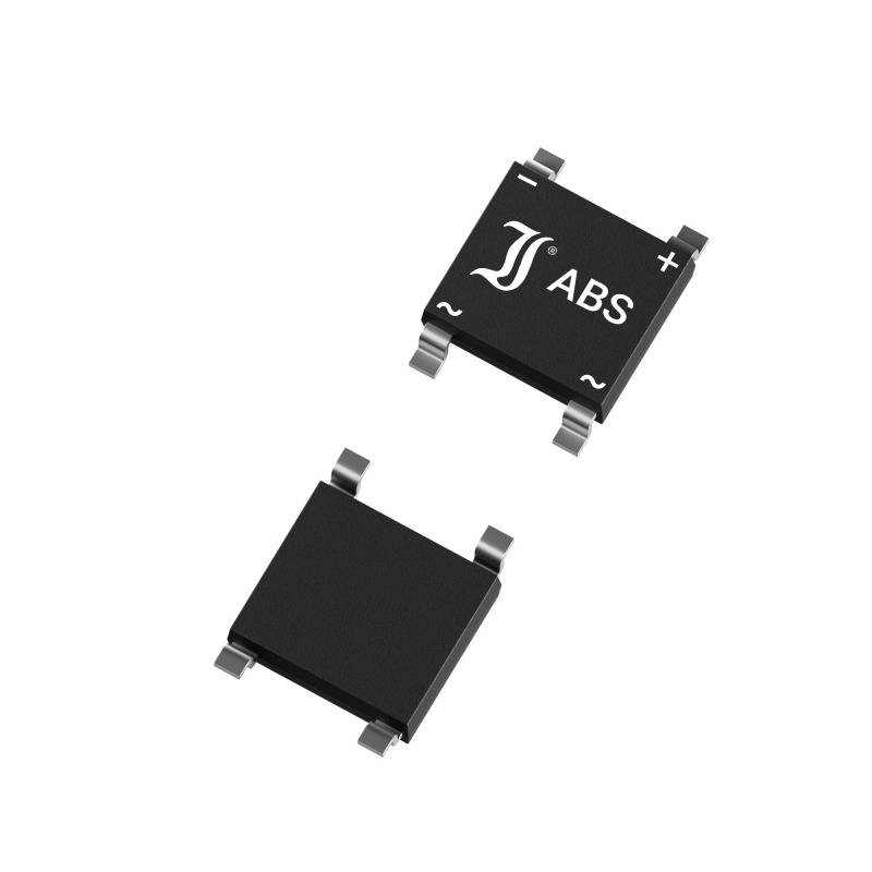 Two black electronic chips on a white background, one displaying the label 'ABS'.