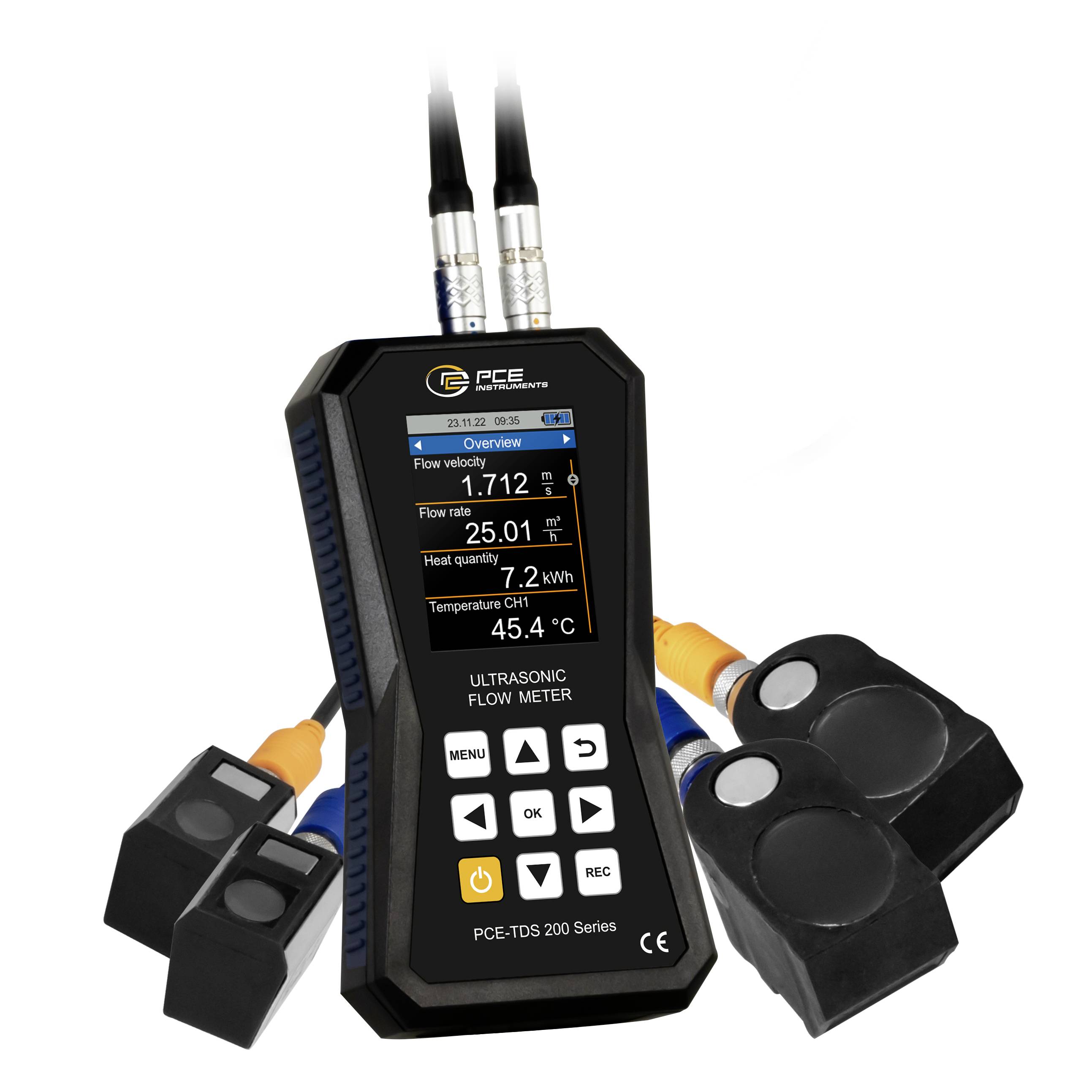 Handheld ultrasonic flow meter with display and connected sensors measuring flow, heat quantity, and temperature.