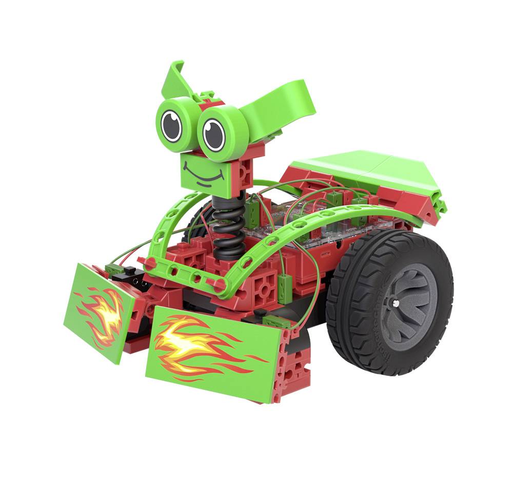 A colourful, toy-like robot made of plastic, primarily in green and red, with large, smiling eyes and decorative flames.