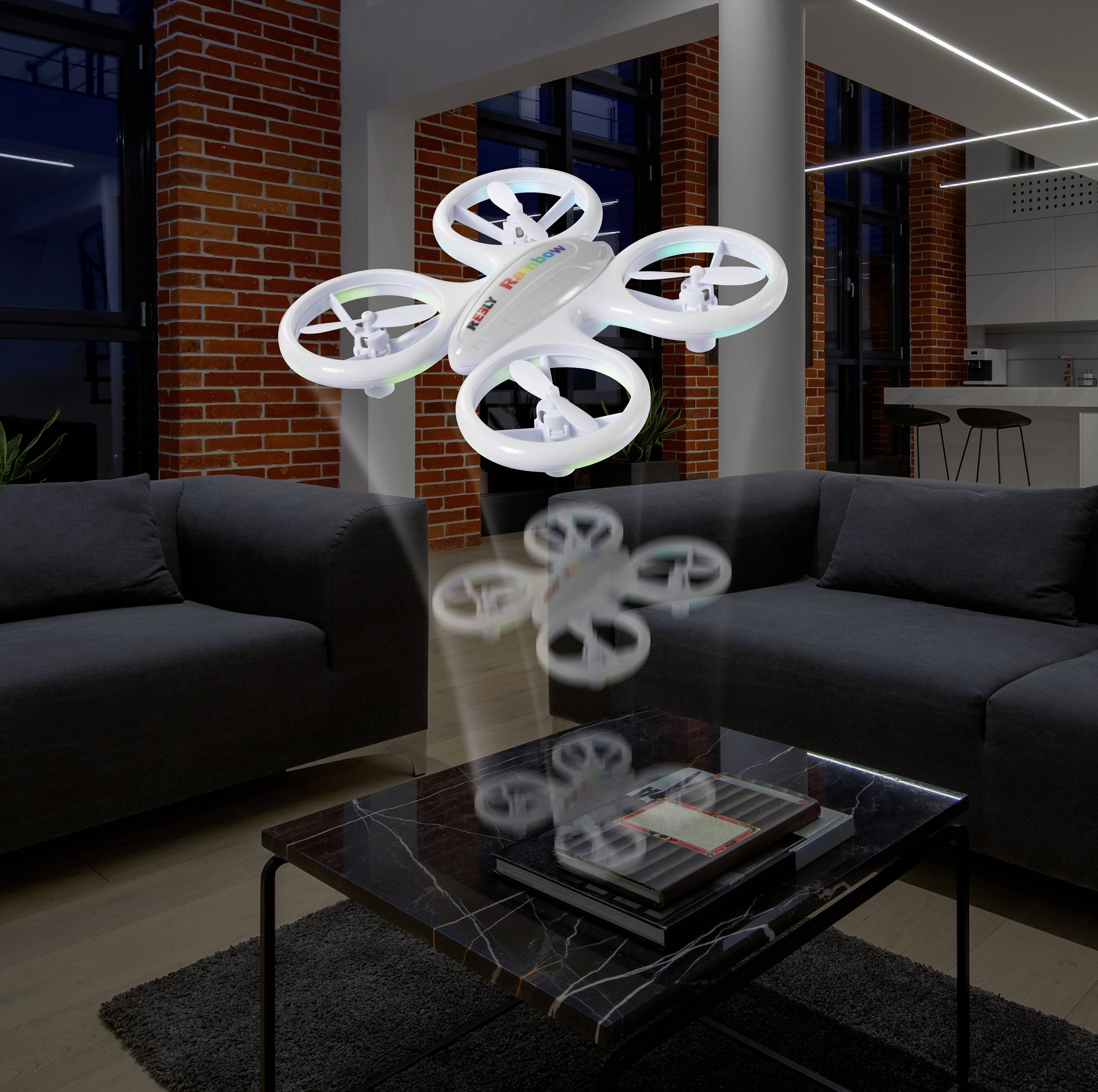 A drone hovers in a modernly furnished living room above a marble coffee table between two dark sofas.